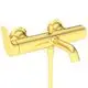 Goldene Badearmatur von Ideal Standard mit einem Handbrause-Set und einem schlichten, modernen Auslauf, montiert an zwei Wänden.